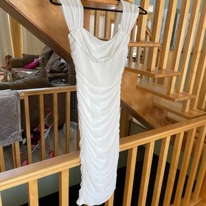 White tight fitting midi dress